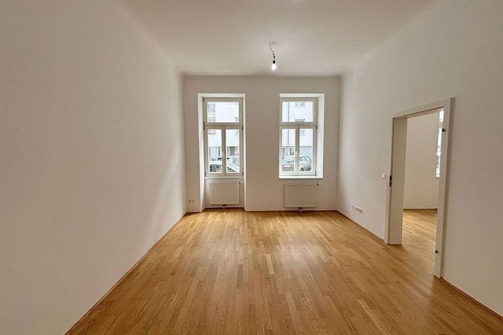 SONNIGE ERDGESCHOSS Wohnung mit Terrasse + Eigengarten in schönem ALTBAU 1100 Wien